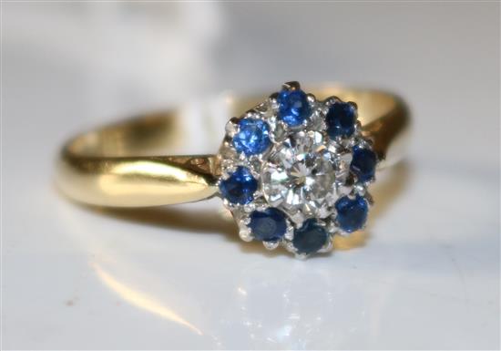 A sapphire and diamond cluster ring